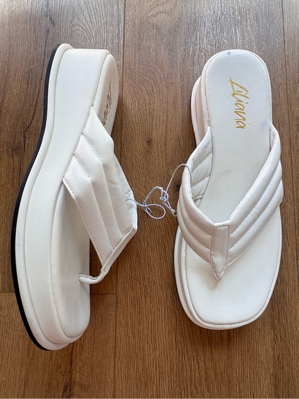 Wedge flip flops white